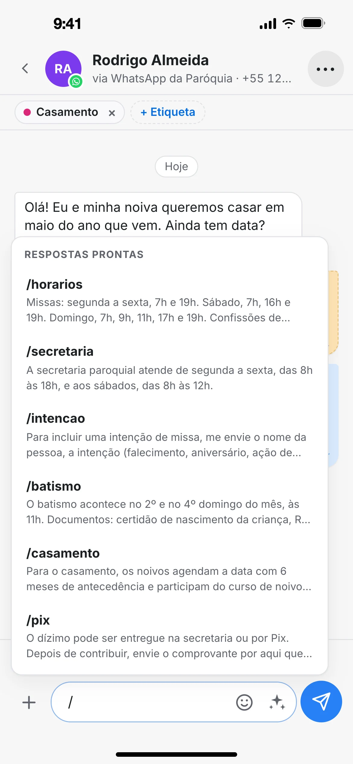 Respostas prontas do NOAV abertas ao digitar a barra: horários, secretaria, intenção, batismo, casamento e Pix